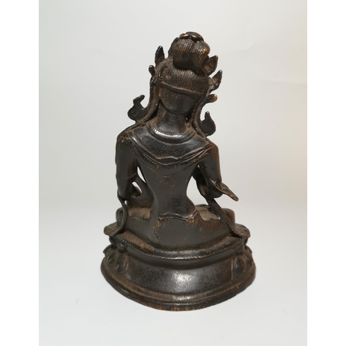 131a - A Far Eastern gilt bronze figure of Buddha in  the lotus position, height 19 cm, possibly Thai