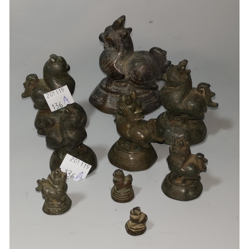 136a - A Burmese set of 9 graduating bronze opium weights in the form of mythical birds, largest 8 cm