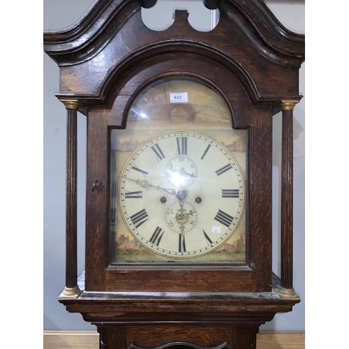 633 - An early 19th century oak longcase clock with painted dial, arch top hood and 8 day weight driven mo... 