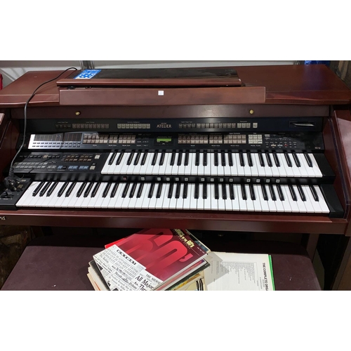659a - An AT 90 twin manual electric organ by Roland Atelier, with stool