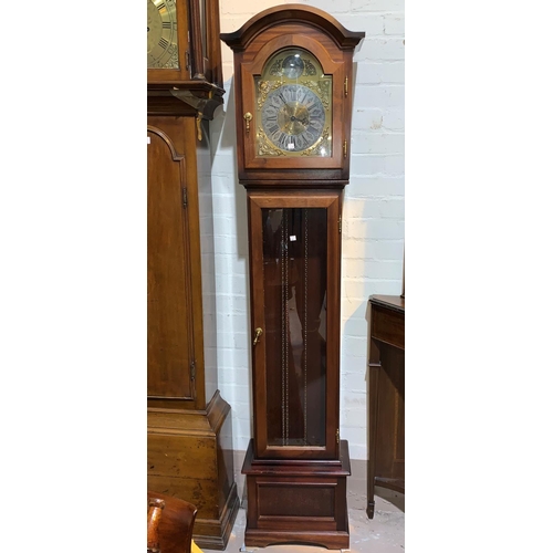 660a - A mahogany reproduction longcase clock with brass dial