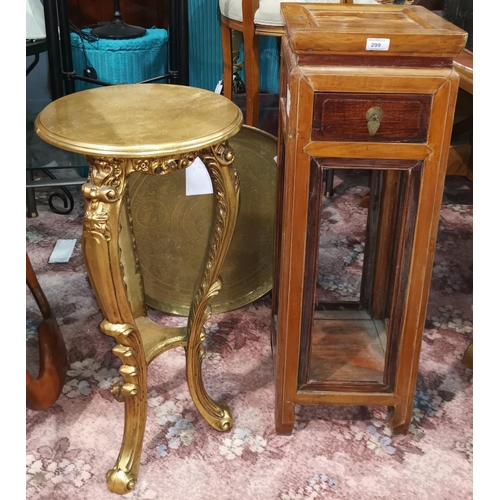 299 - A Chinese hardwood plant stand and another gilt rococo style plant stand