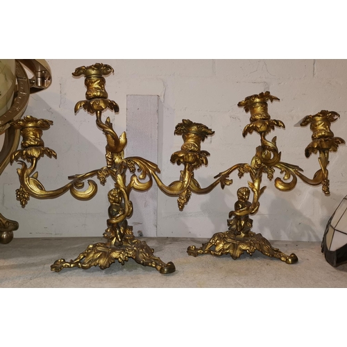 436 - A 19th century pair of rococo candelabra, 3 branches, height 34 cm