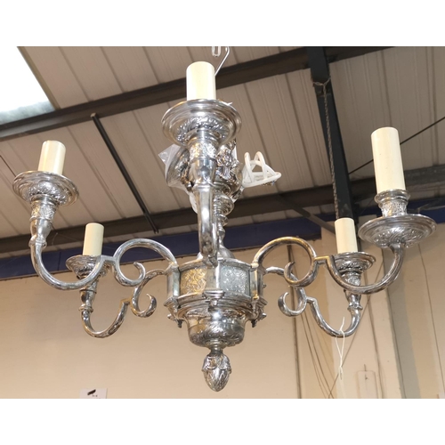 527b - An ornate chromed 6-branch chandelier