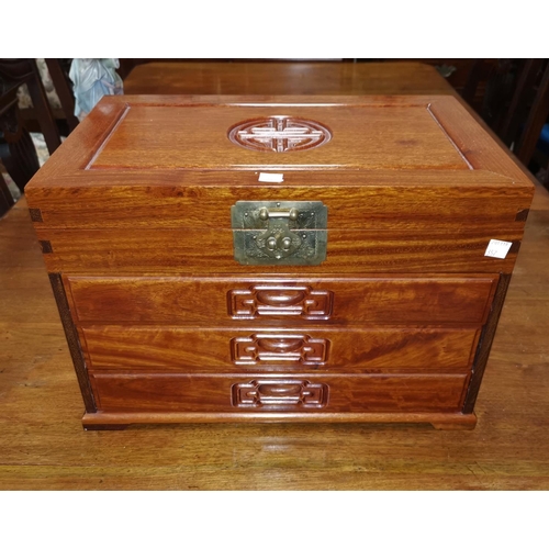357 - An oriental hardwood miniature cabinet of 4 drawers fitted for cutlery