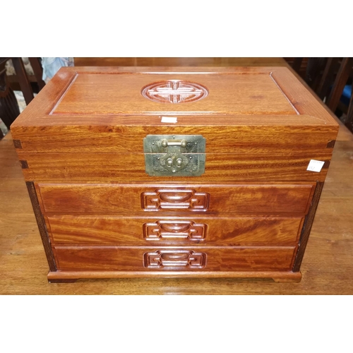 357 - An oriental hardwood miniature cabinet of 4 drawers fitted for cutlery