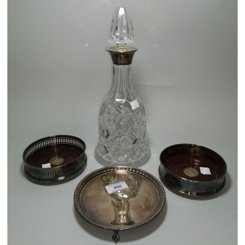 368 - Two modern silver mounted wine coasters; a similar cut glass decanter; a small silver salver