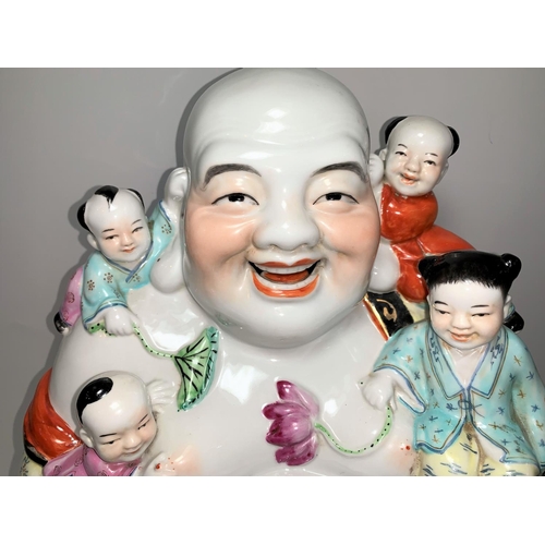 132 - A 20th century Chinese Canton large figure of Hoti with children, in the famille rose palette, heigh... 