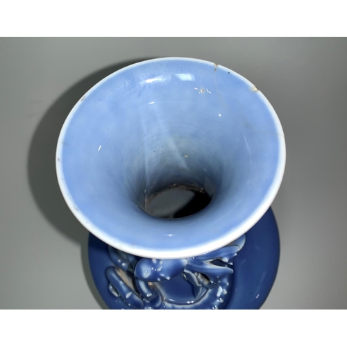 135a - A Chinese blue glaze baluster vase with entwined relief dragon to neck, printed seal mark to base, h... 