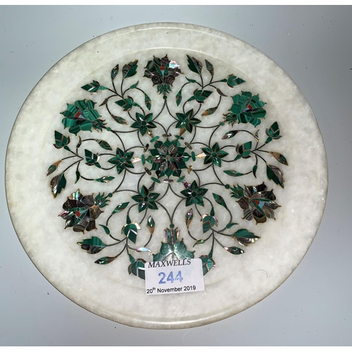 244 - An Indian alabaster circular plaque inlaid semi-precious stones, 23 cm; a similar item
