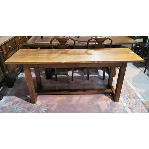 647 - A 20th century yew-wood refectory style side table with stretcher below, on square legs, 183cm