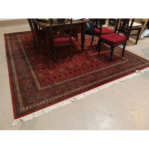 653a - A red ground 'Royal Keshan' Persian pattern carpet and 2 similar rugs