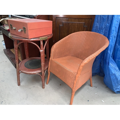 679 - A brown Lloyd loom armchair and 2 tier occasional table