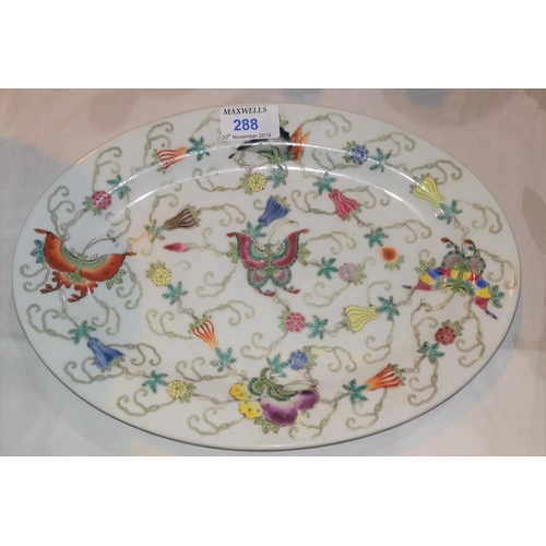 64 - A mid 20th century Chinese porcelain oval dish decorated with polychrome butterflies, fruit, etc., l... 