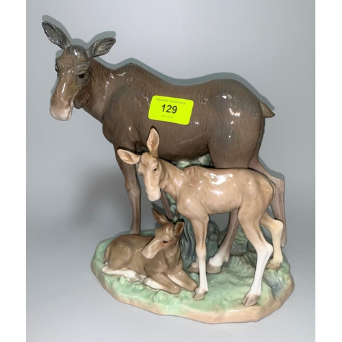 35 - A late 1970's / early 80's Lladro group of elk with 2 young by Salvador Furio (1 ear restored)