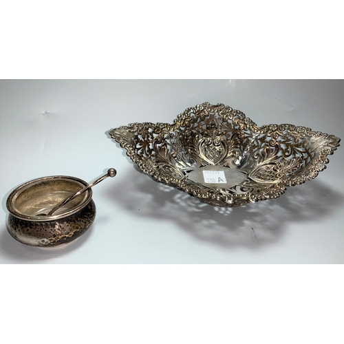 130a - A hallmarked silver pierced dish on oval foot, Sheffield 1907, 4.3 oz; a hallmarked silver salt and ... 