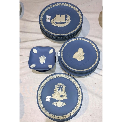 32 - A collection of Wedgwood blue Jasperware plates, including 6 Christmas plates; 10 smaller plates and... 