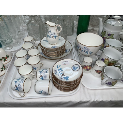 5 - An early 20th century part tea service decorated with sailing boats and oriental imagery in cream, b... 