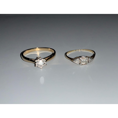 111 - A 9 carat hallmarked gold ring with illusion set diamond; an Art Deco 3 stone diamond ring (shank wo... 