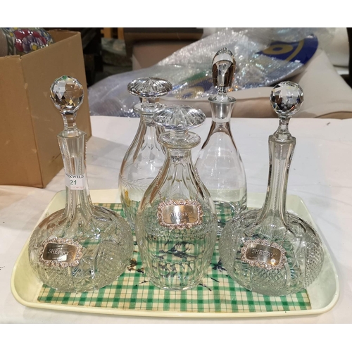 21 - A 19th century pair of slice cut mallet shaped decanters; an Edwardian pair of cut sherry decanter; ... 