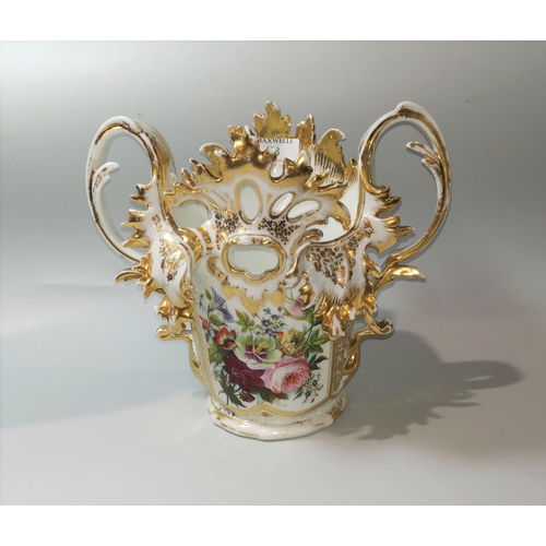 53 - A mid 19th century vase with ornate decoration in polychrome and gilt, scroll and acanthus handles a... 