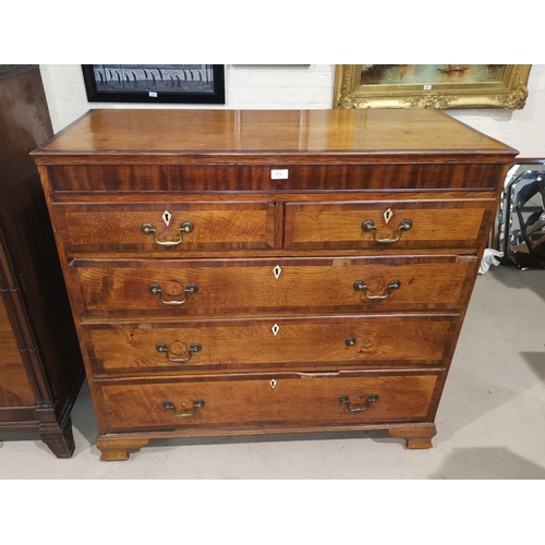 314 - An early 19th century crossbanded golden oak chest of 3 long and 2 short drawers with brass swan nec... 