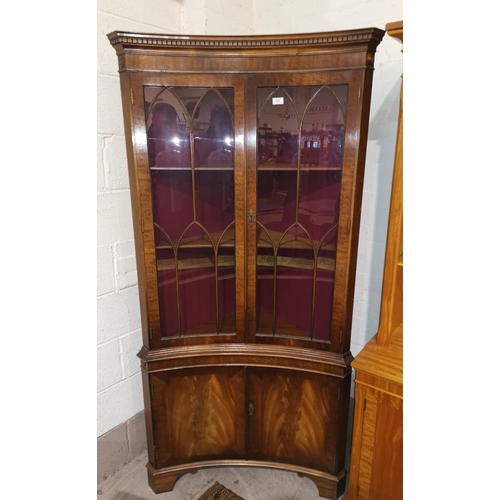 426 - A Georgian style full height corner display cabinet in the manner of Bevell Funnell, free standing w... 