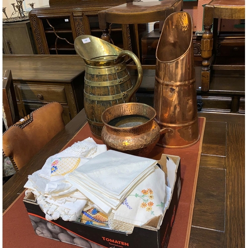149 - A large brass bound wooden jug; a copper vase; a copper coal scuttle; a selection of table linen