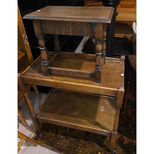 323 - An oak 2 tier tea trolley; a coffin stool; 2 wall mirrors