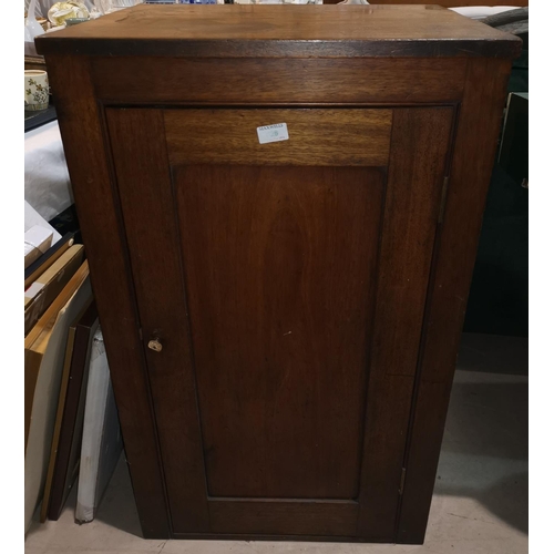 326 - A 19th century mahogany pedestal side cabinet enclosed by single door; a stained wood blanket box
