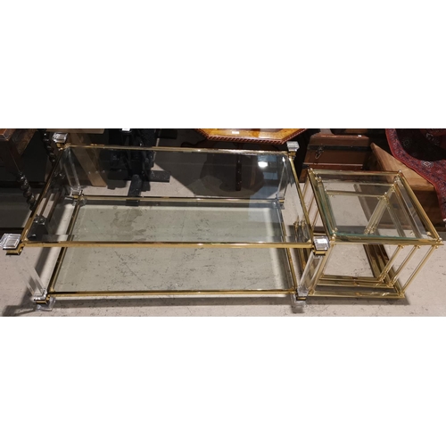 334 - A brass and plate glass coffee table with corner column supports, 125 cm; a nest of similar tables