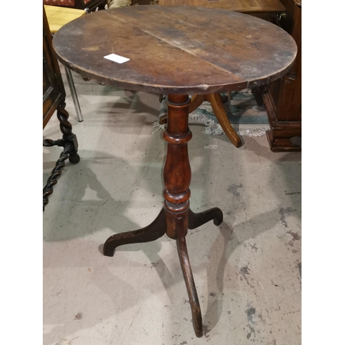 379 - An early 19th century circular mahogany wine table on tripod base