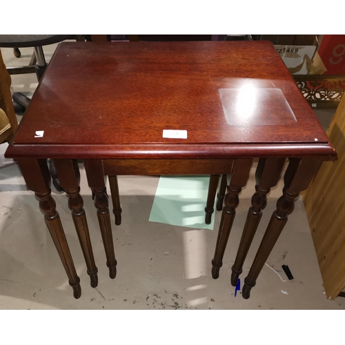 381 - A nest of 3 mahogany occasional tables