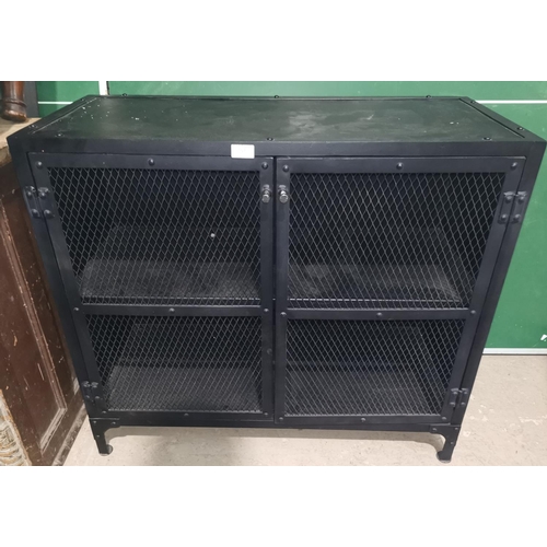 451 - A black metal side cabinet enclosed by 2 mesh doors