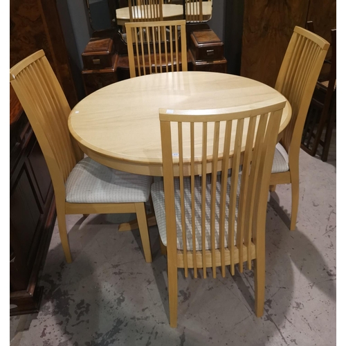 475 - A modern lightwood dining suite with extending circular table and 4 high rail back chairs
