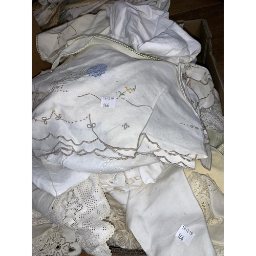 166 - A selection of unused sheets and decorative linen