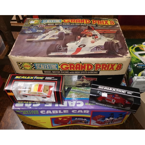 158a - A Scalextric Grand Prix 8 set, boxed; 2 other cars; another boxed car game