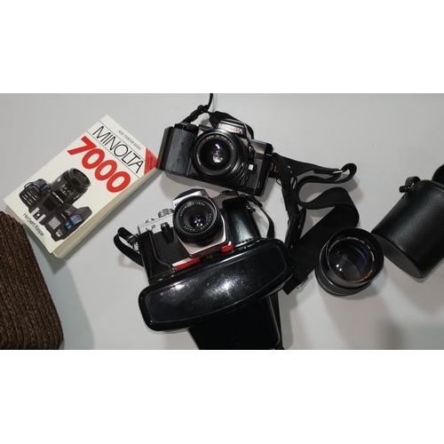 201 - A Minolta 7000 SLR camera with 35-70 mm lens; a Chinon 135 mm lens; a Pentacon camera; etc.