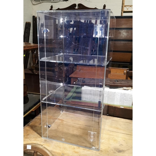 444A - A perspex three height display cabinet
no key