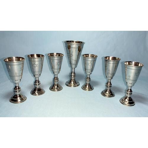 239 - A set of 7 silver Kiddush cups, engraved decoration, Birmingham 1918, 5.4 oz