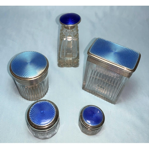 241 - A cut glass rectangular jar with blue enamel silver top; a matching circular pot, Birmingham 1928; 3... 
