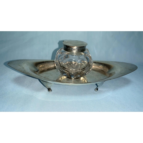 250 - A silver boat shaped inkstand with cut glass bottle, having hinged silver lid, Maker A & JZ, Birming... 