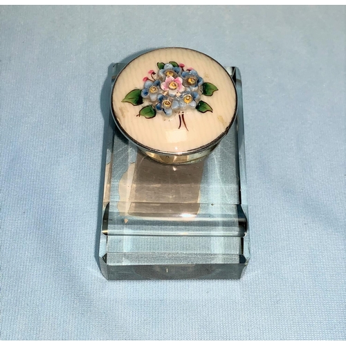 256 - A cut glass inkwell with silver gilded mount, the hinged top decorated with flowers in colour relief... 