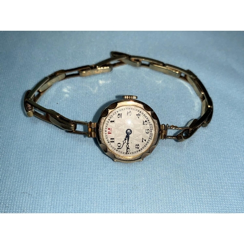 321 - An early 20th century ladies gold wristwatch with gold strap (metal springs), 13.6 gm gross weight