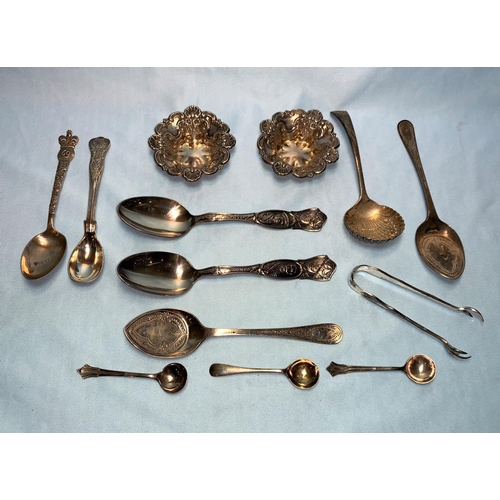 314 - A hallmarked silver pair of salts; a pair of preserve spoons; silver sugar tongs; a silver commemora... 
