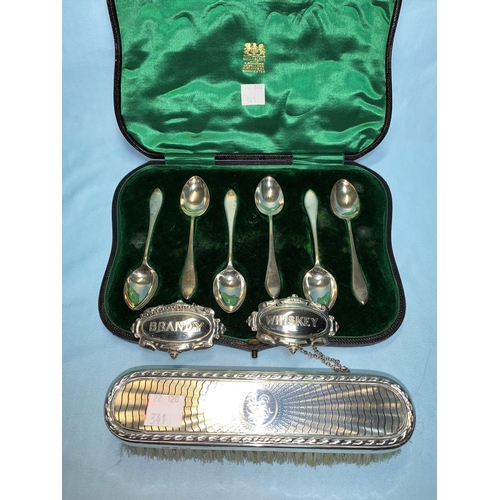 341 - A set of silver coffee spoons; a pair of silver wine labels; a clothes brush