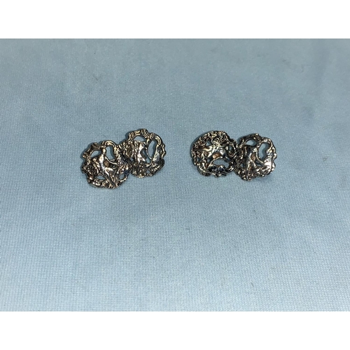 344 - Jenny Knott:  a pair of gents cufflinks formed from Art Nouveau silver buttons, cased