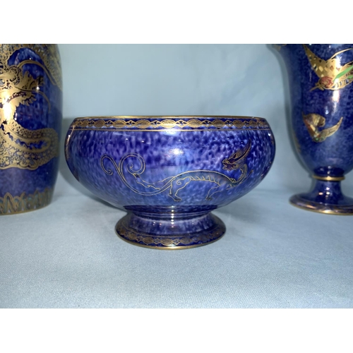 156 - A Wedgwood mottled blue lustre vase decorated with birds of paradise; a Wedgwood mottled blue bowl d... 