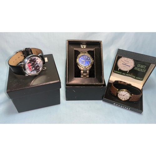 295 - A gents Accurist wristwatch, boxed; a Beatles commemorative wristwatch boxed; and another