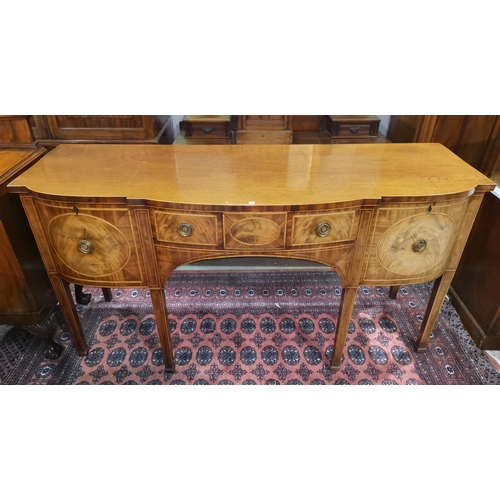 597 - A 19th century style mahogany sideboard with inlaid decoration, 'D' front, frieze drawer and 2 deep ... 